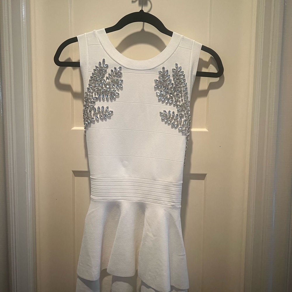 Bebe embellished peplum top